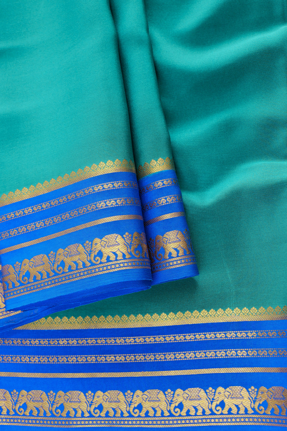 Pure Mysore silk saree in teal and blue combination with gold zari detailing