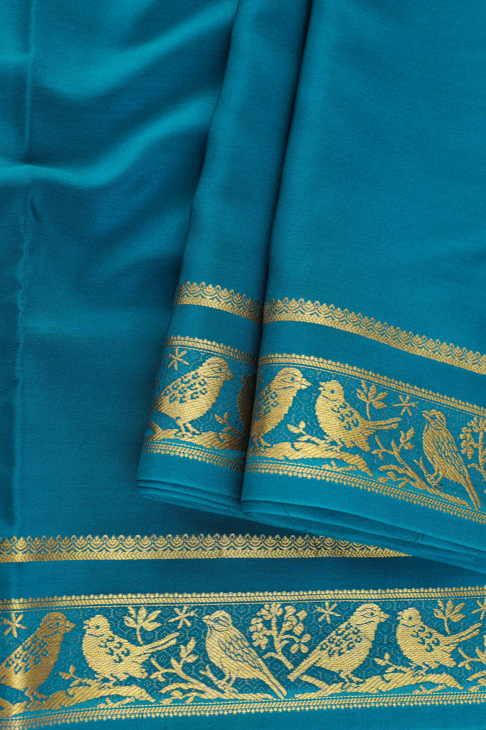 Pure Mysore silk saree in teal blue with traditional gold zari detailing