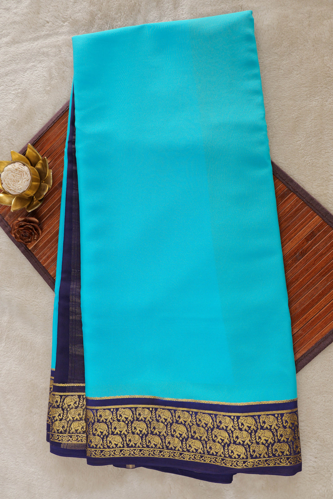 Pure Mysore silk saree in turquoise blue with navy border and golden elephant motifs