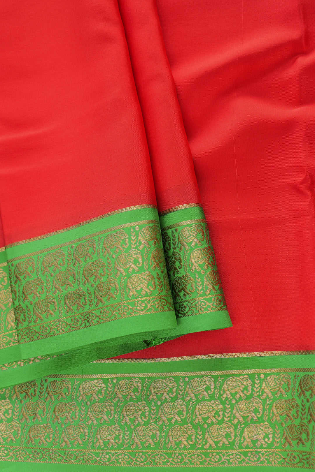 Pure red Mysore silk saree with green border and gold pattern work