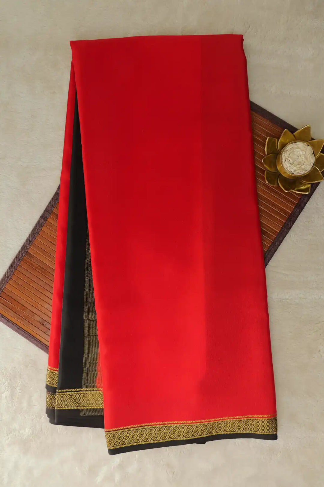 Red Mysore Crepe silk saree with black border and gold zari