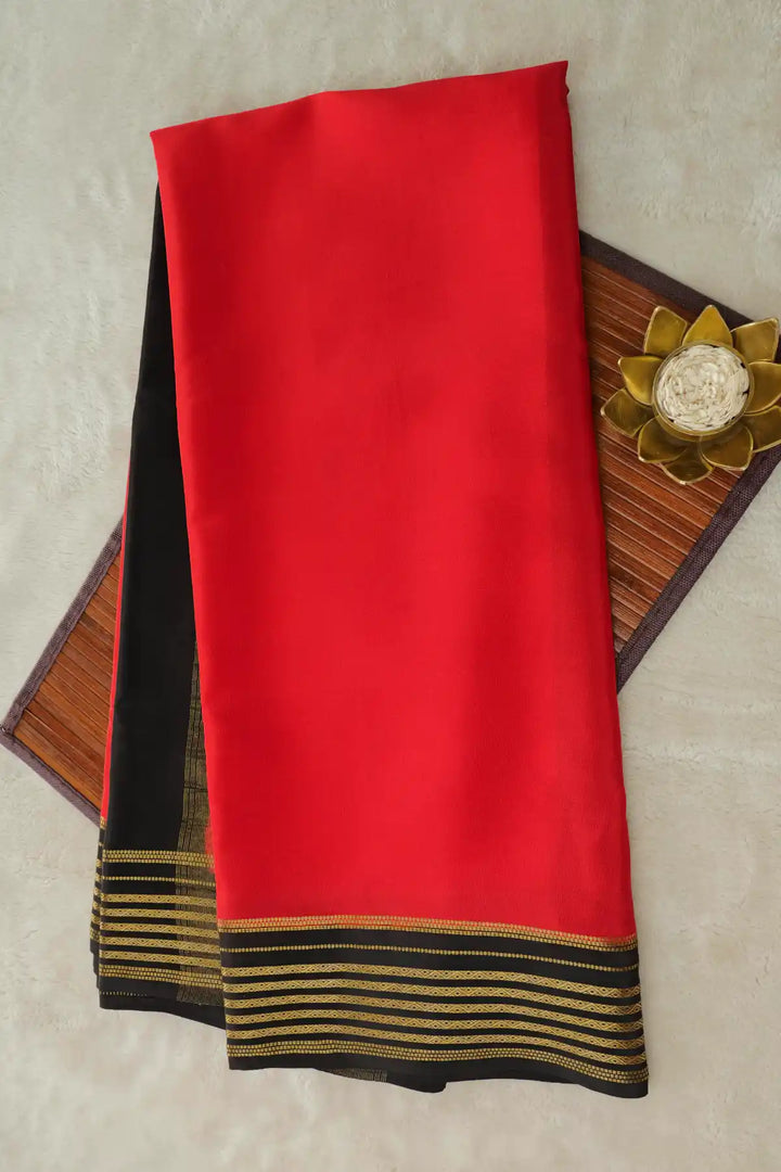 Red Mysore silk saree with black border