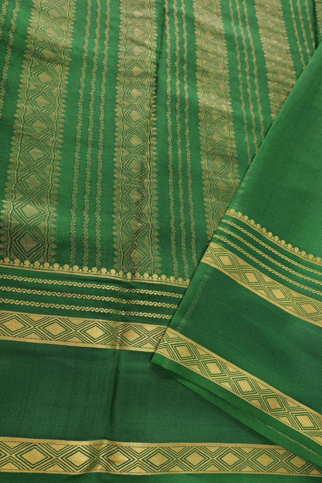 Red Mysore silk saree with contrasting green pallu and golden border