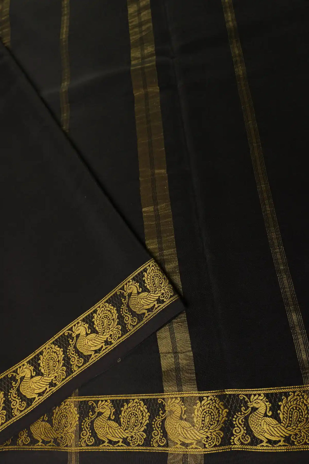 Red and black color party wear mysore silk sarees with peacock border