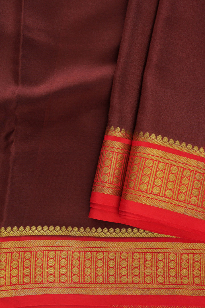 Rich brown Mysore silk saree with red and gold zari border