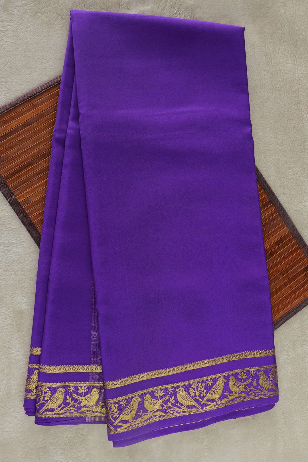 Rich purple Mysore silk saree with elegant gold zari border