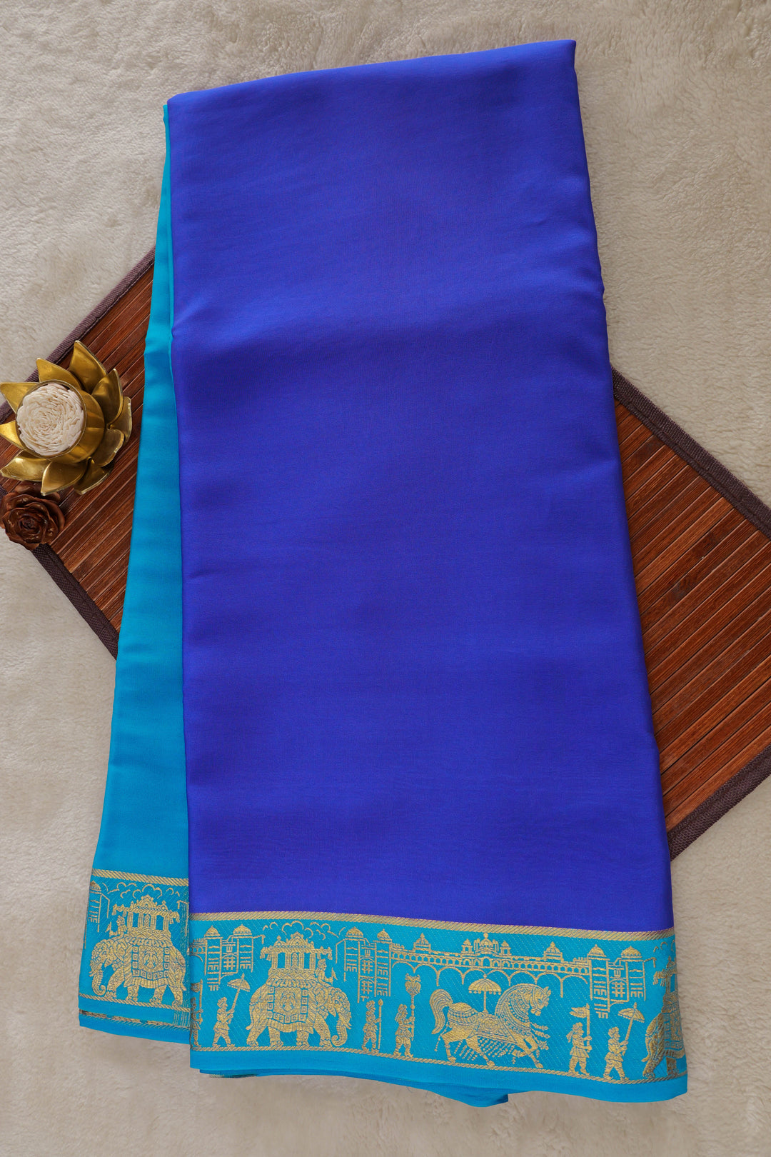Royal blue Mysore silk saree with turquoise pallu and temple border