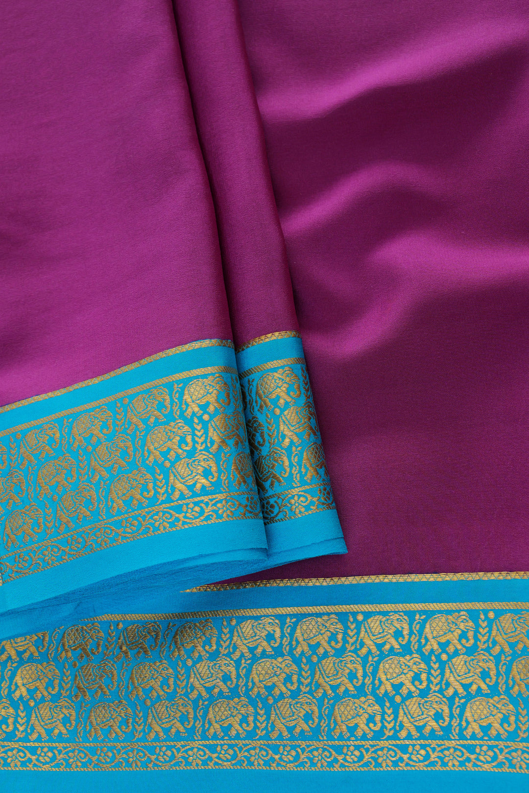 Royal purple Mysore silk saree with contrast blue border and golden weaving