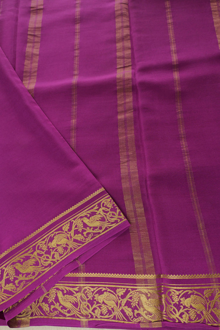 Royal purple silk saree with gold woven pallu and border