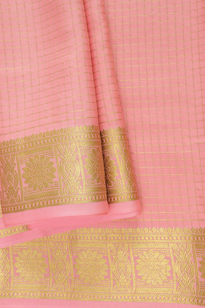 Soft pink Mysore Silk saree with a golden checkered body and gold patterns