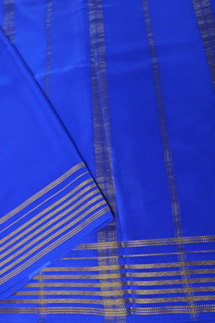 Traditional green Mysore silk saree with blue pallu