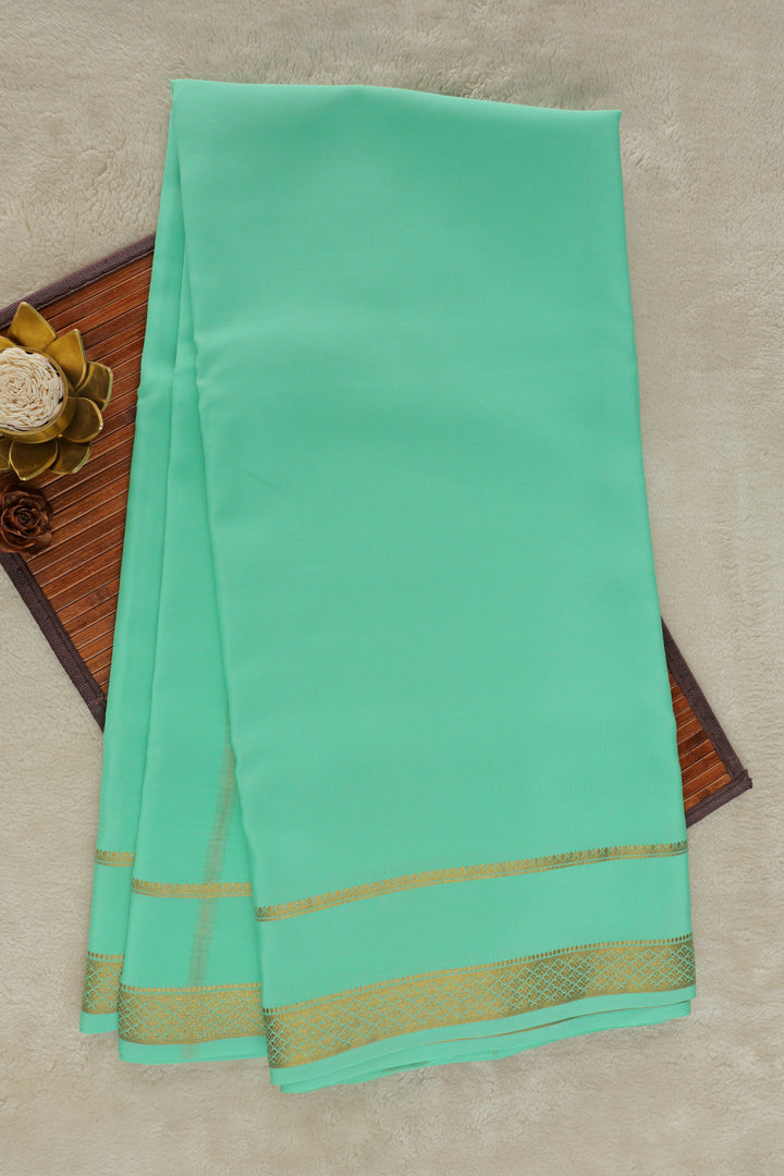 Turquoise Mysore silk saree with gold border