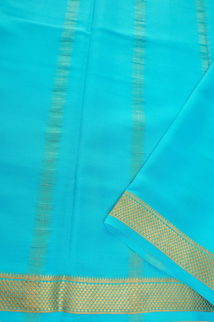 Turquoise Mysore silk saree with rich gold woven pallu