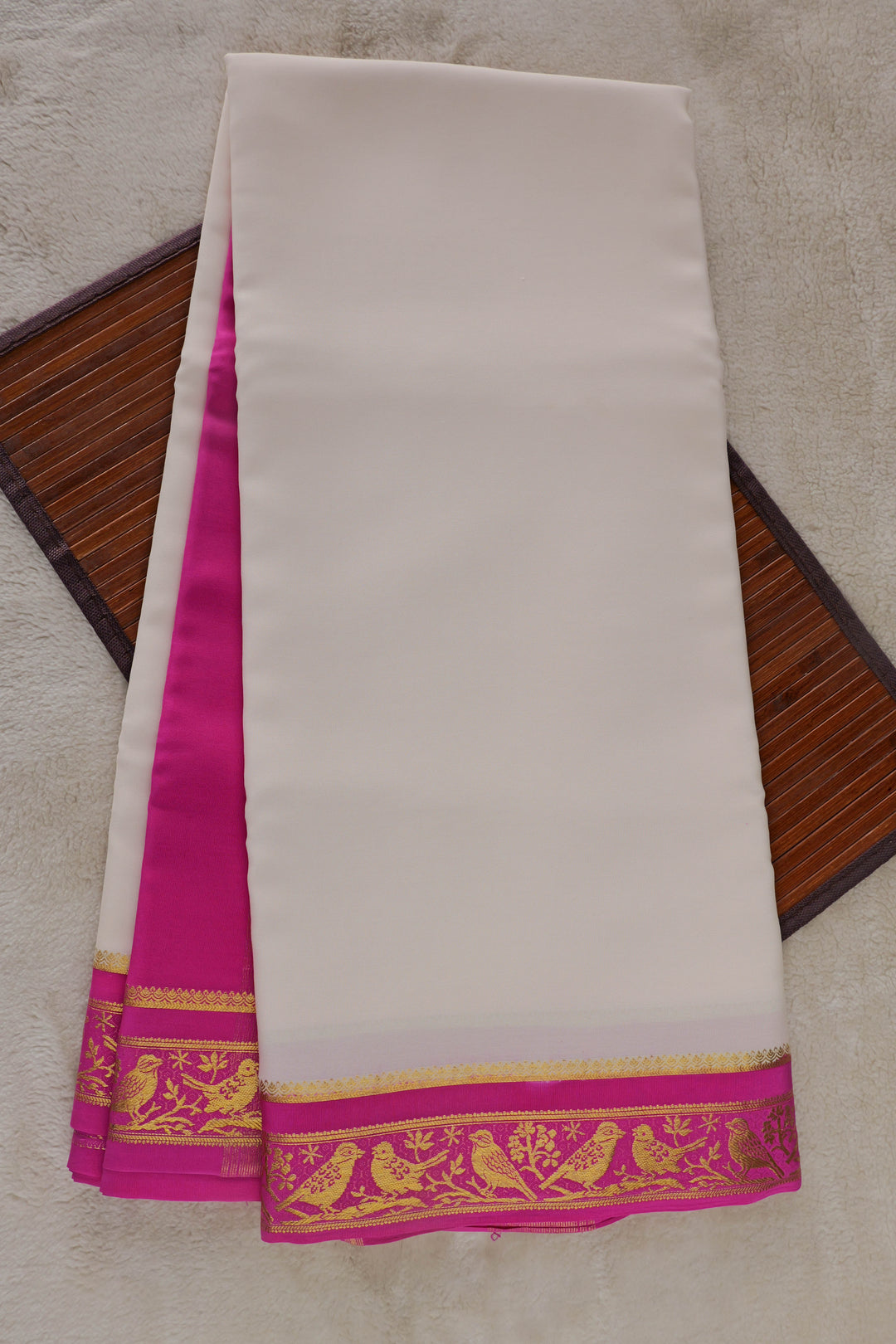 White Mysore silk saree with pink border and gold zari embroidery