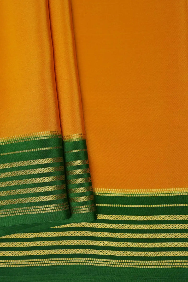 Yellow Mysore Silk Saree with green striped border and blouse