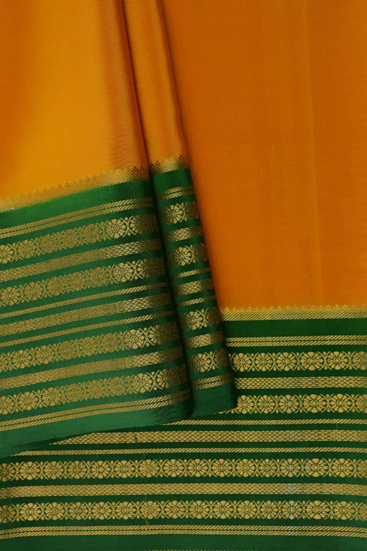 Yellow Pure Mysore silk saree with green border
