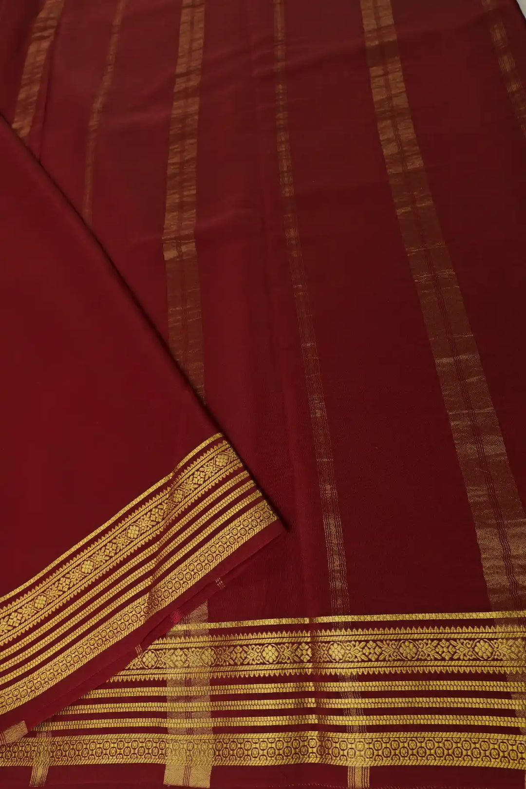 Yellow silk saree with gold zari border