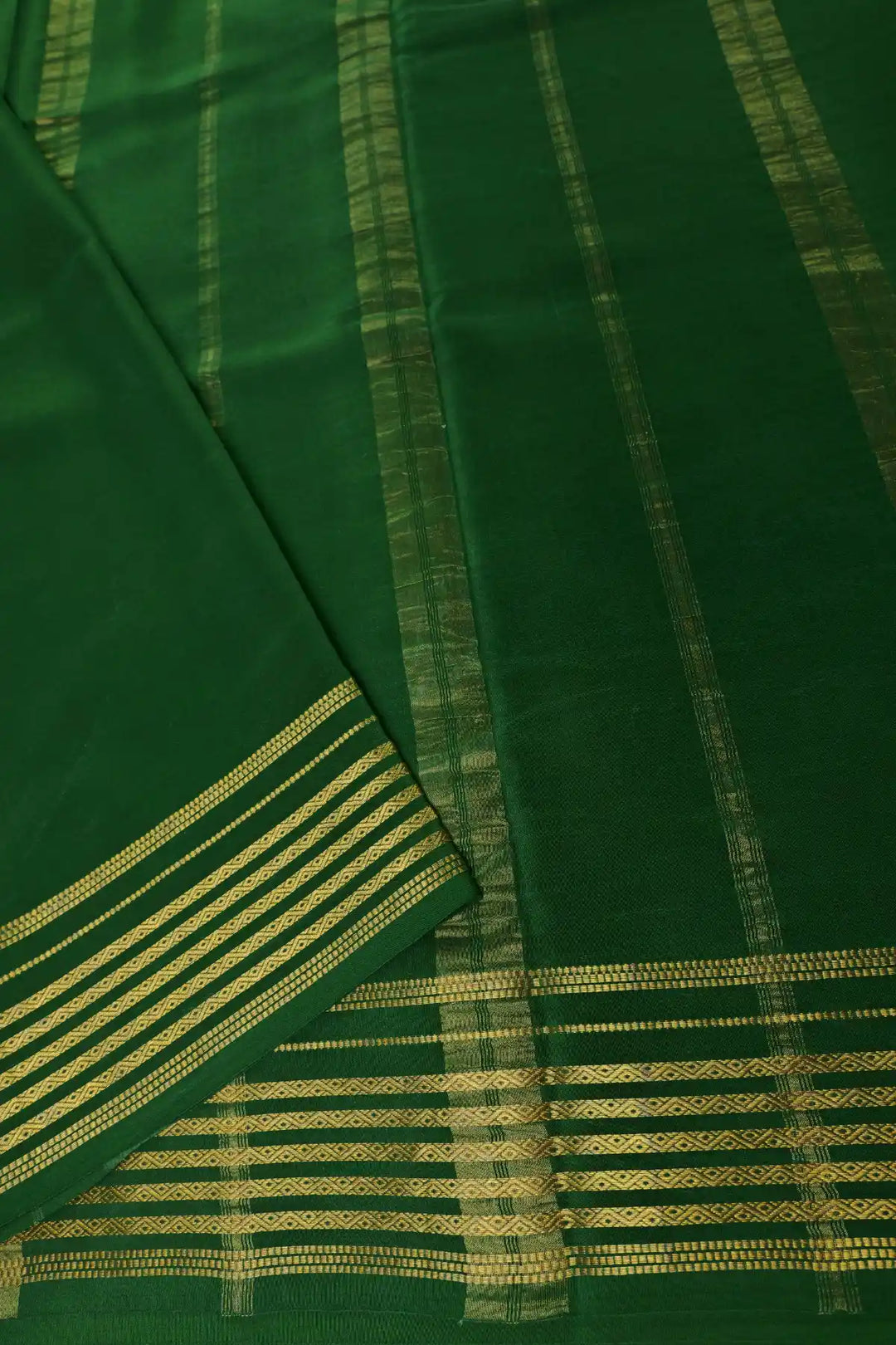Yellow silk saree with green border and gold zari