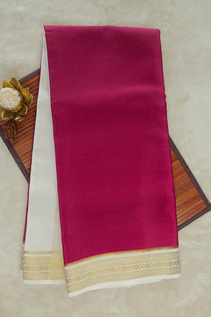 bright pink Mysore silk saree with golden zari border