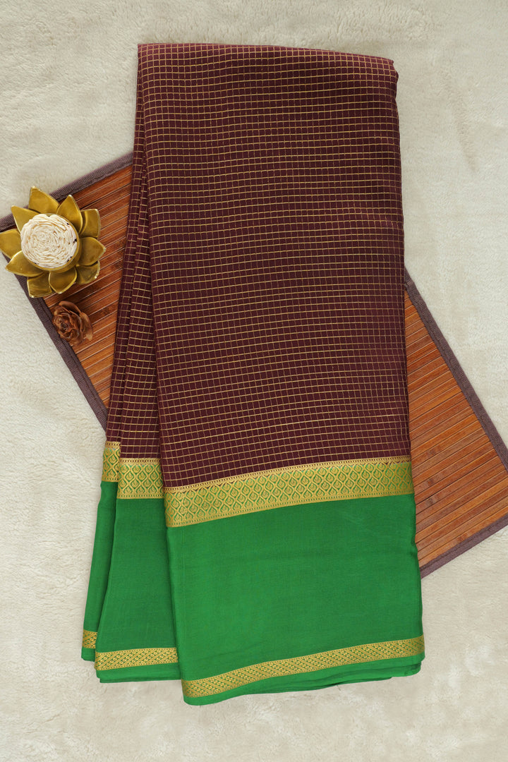 brown Mysore silk saree with a striking green pallu and gold zari border