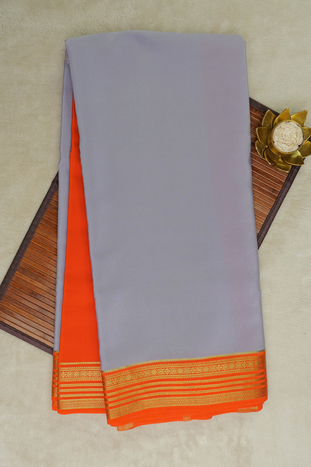gold lace mysore silk sarees in gray and orange with contrast blouse