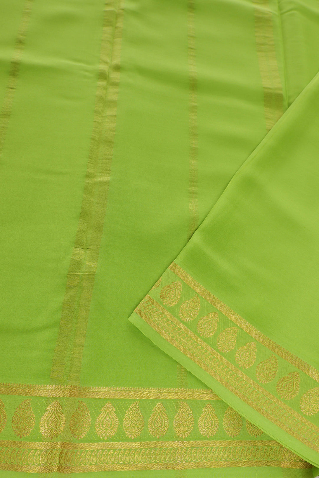 green Mysore silk saree adorned with gold zari  pallu