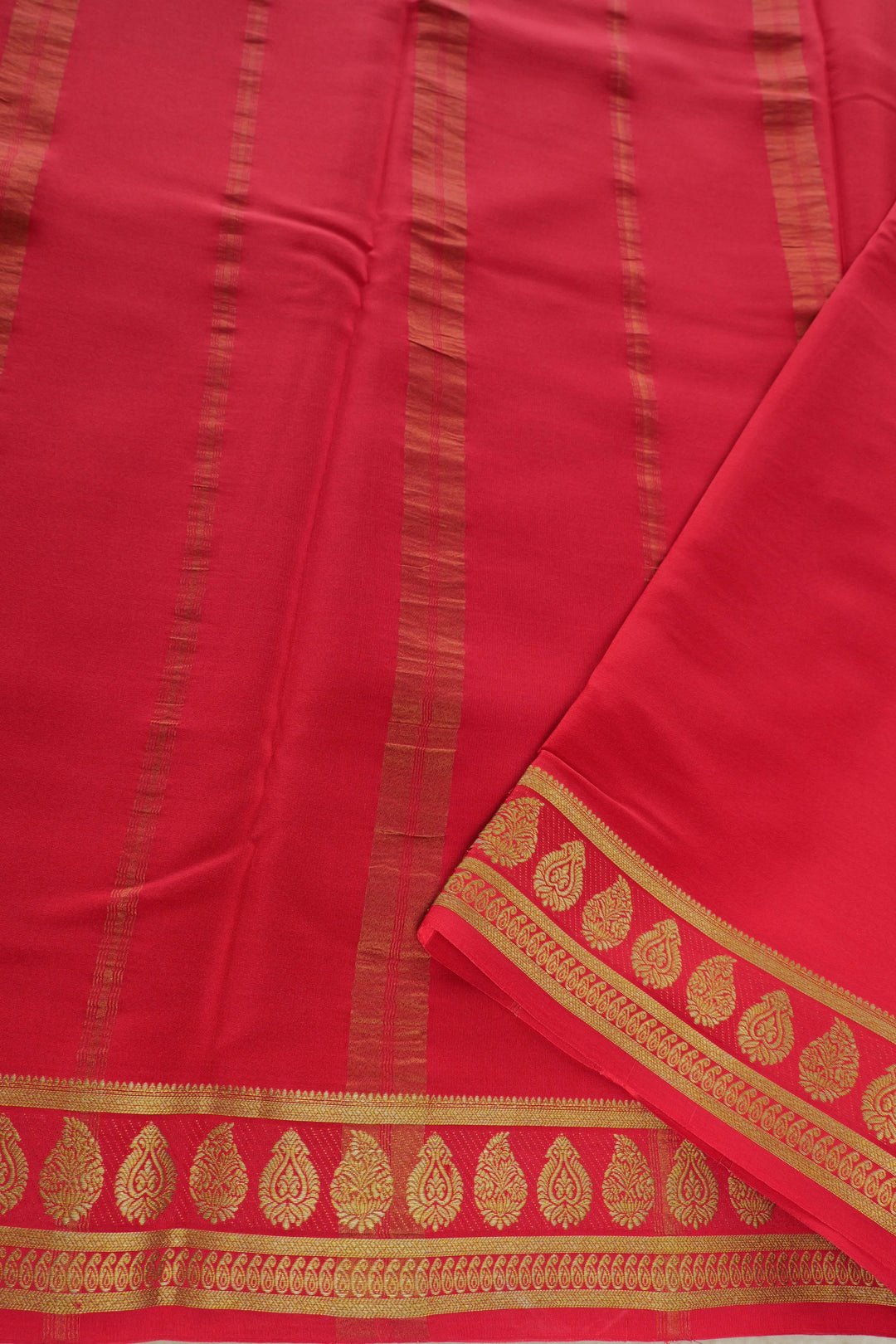 green Mysore silk saree with contrasting red and gold border pallu