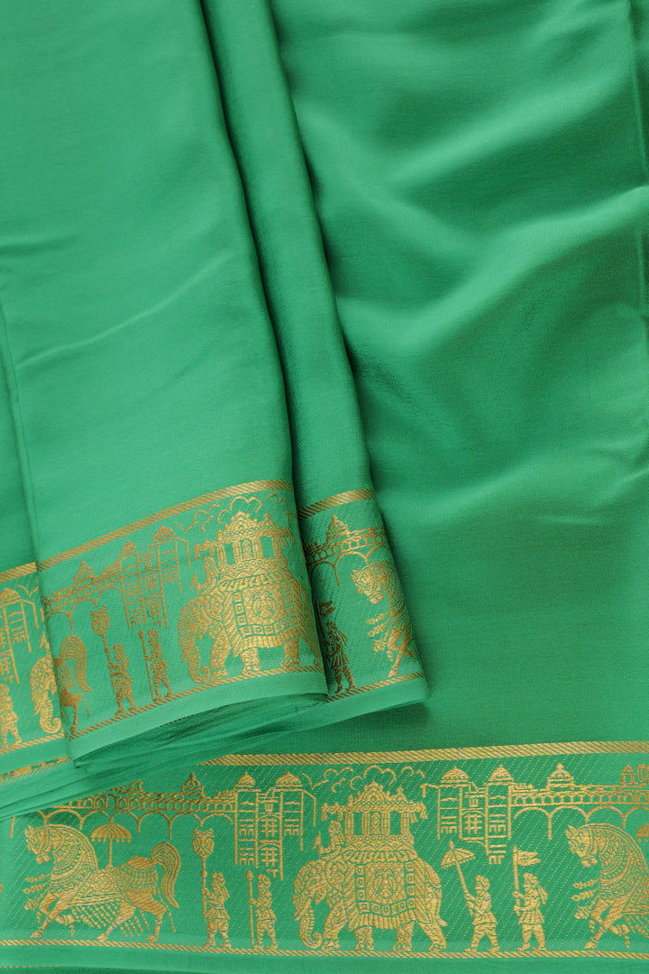 green Mysore silk saree with golden zari temple patterns