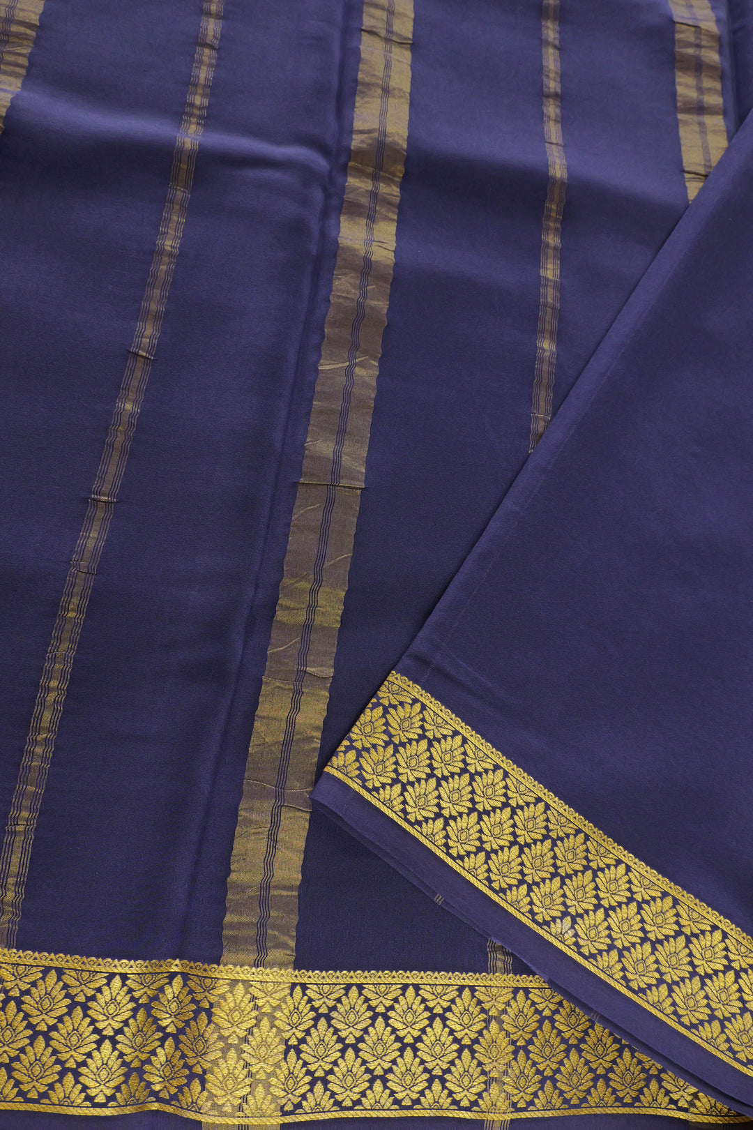 green Mysore silk saree with rich blue and gold border pallu
