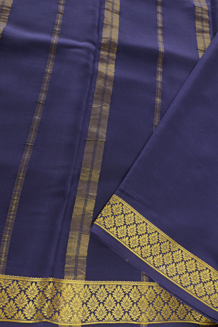 green Mysore silk saree with rich blue and gold border pallu