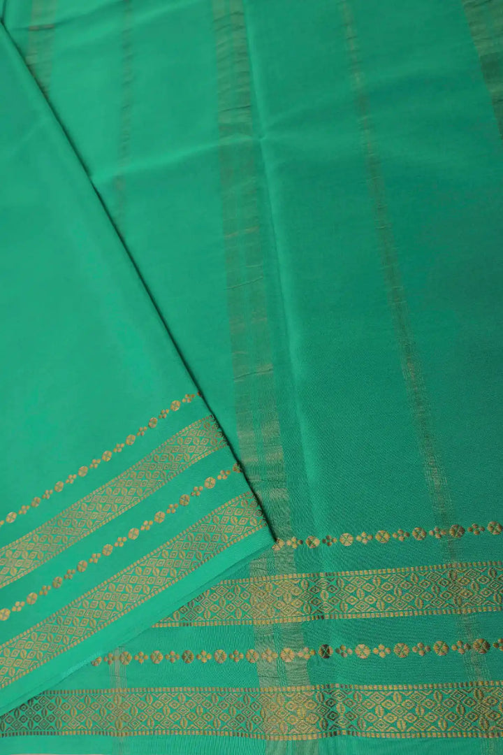 mysore silk latest design sarees in purple and green with contrast blouse