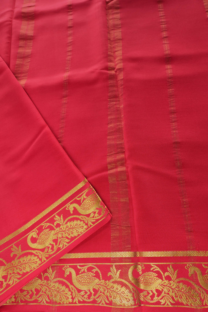parrot green Mysore silk saree featuring a red pallu