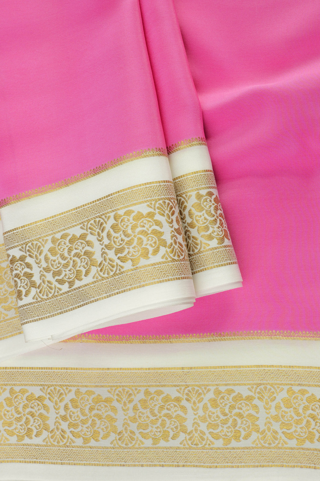 pink Mysore silk saree with white border and golden floral detailing