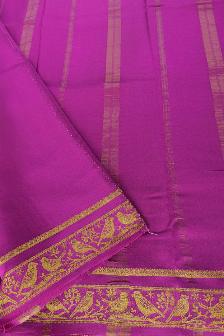 pink silk saree with gold pallu and sparrow border