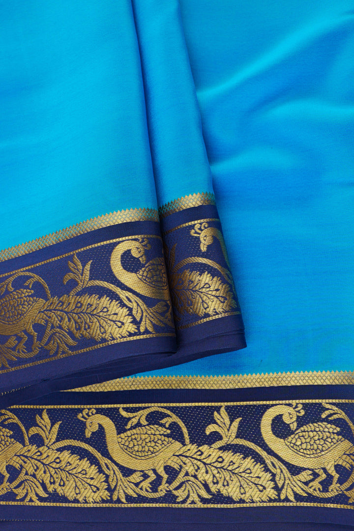 pure Mysore silk saree in blue and navy combination with gold peacock pattern border