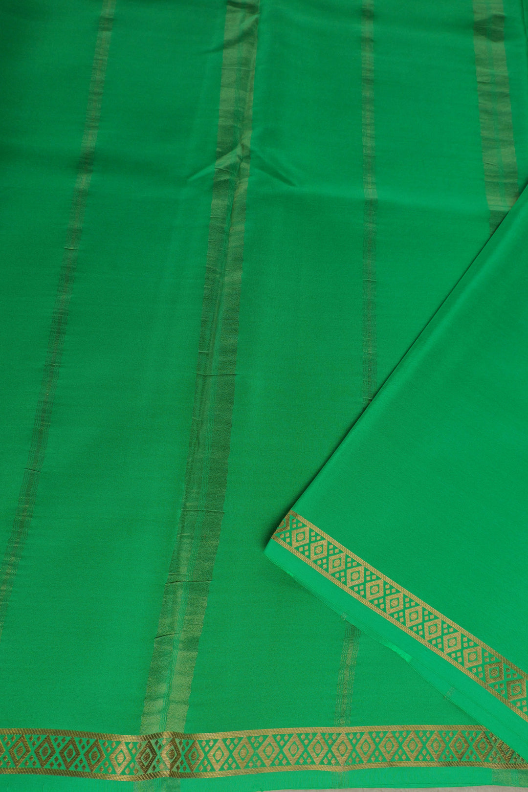 pure Mysore silk saree in green with gold woven border and pallu