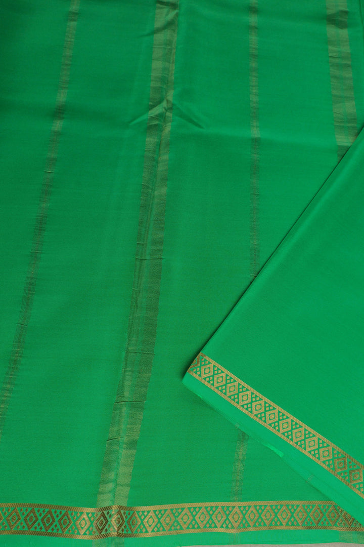 pure Mysore silk saree in green with gold woven border and pallu