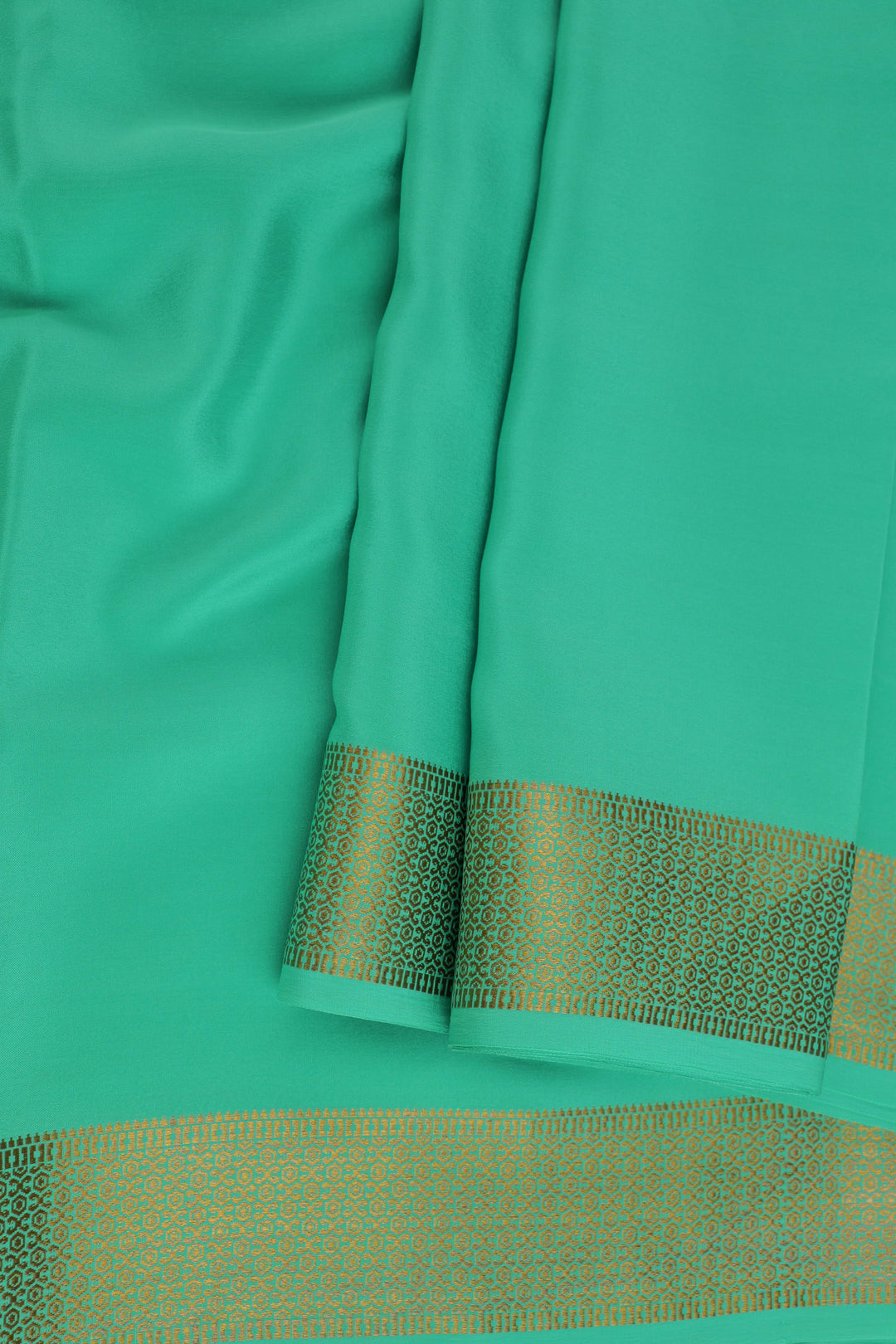pure Mysore silk saree in light green with an intricate woven gold border
