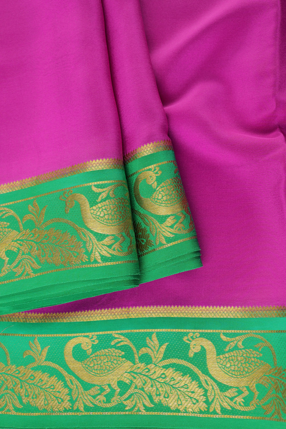 pure Mysore silk saree in pinkish purple with vibrant green peacock border