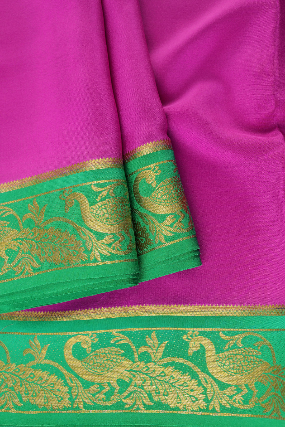 pure Mysore silk saree in pinkish purple with vibrant green peacock border