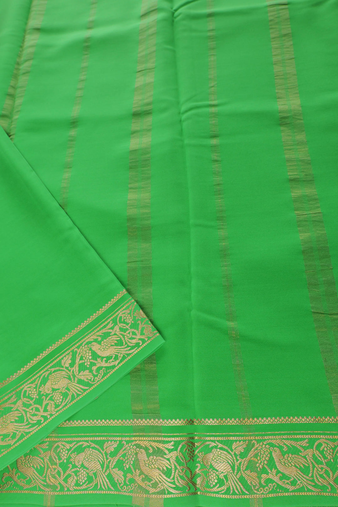 red Mysore silk saree featuring gold zari design and contrasting green pallu