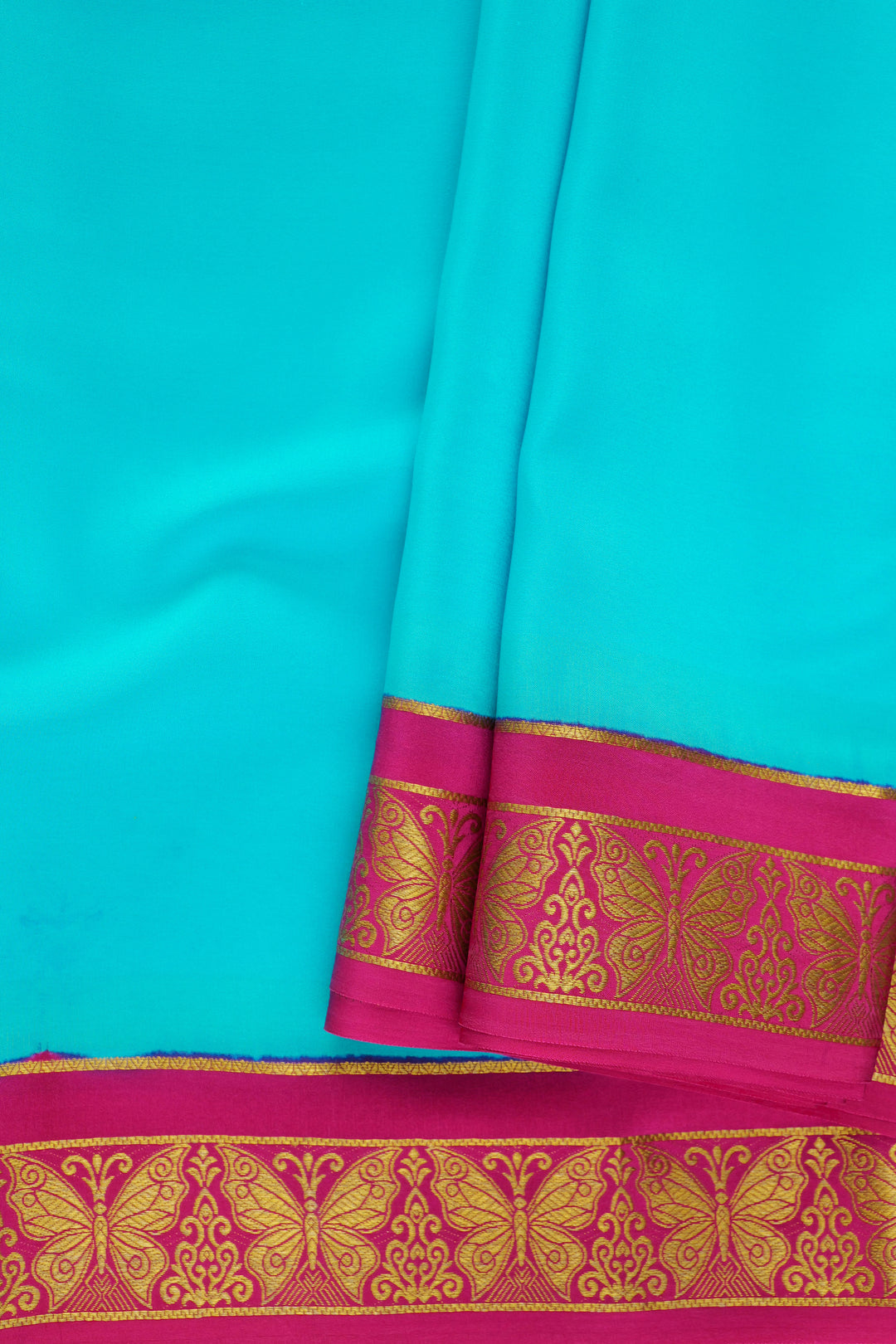 turquoise Mysore silk saree featuring contrast pink border