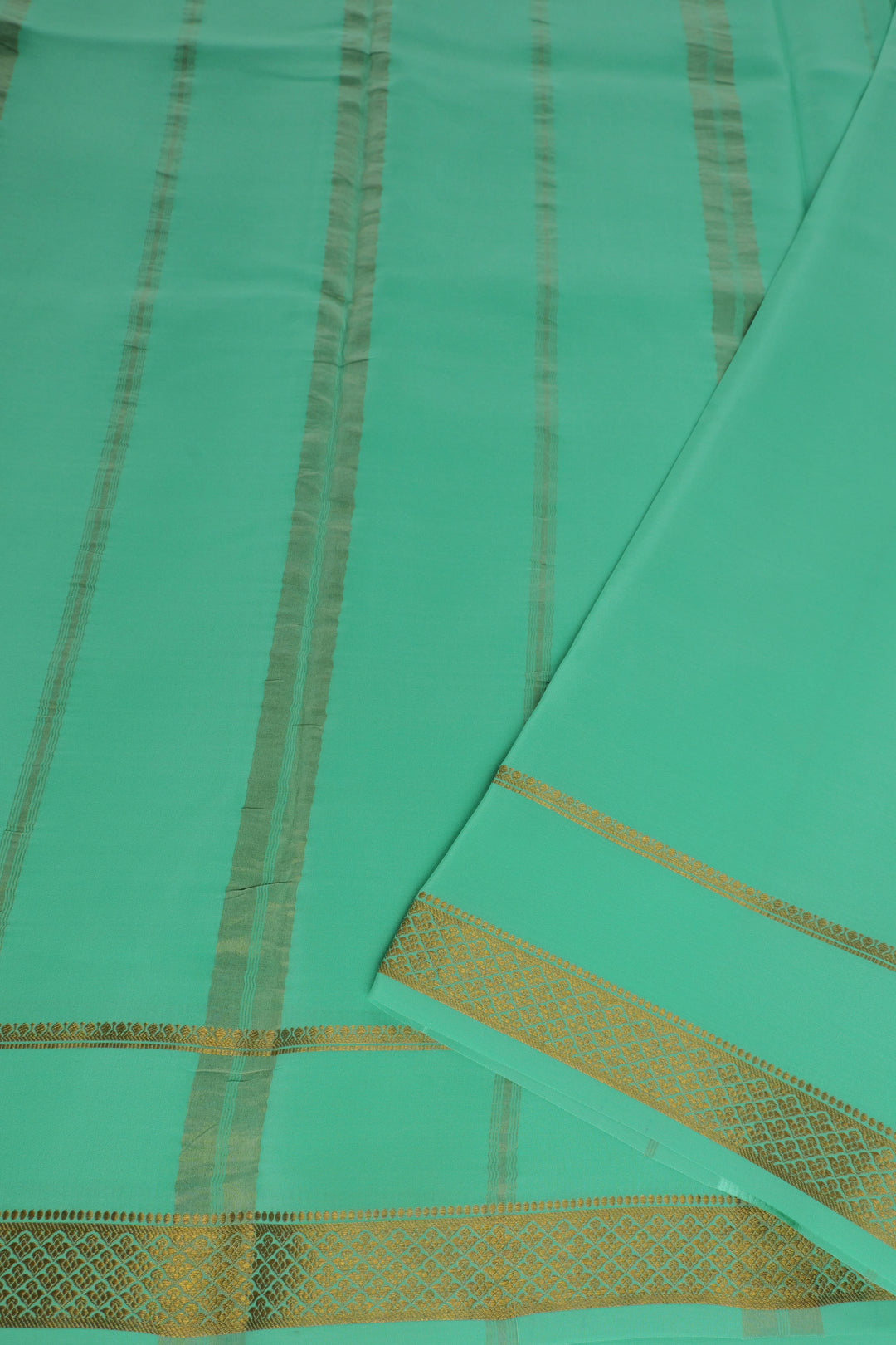 turquoise Mysore silk saree with gold border and pallu