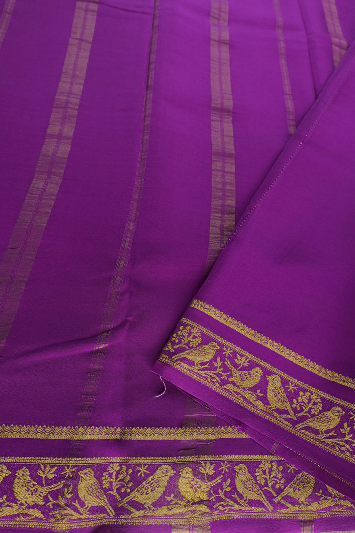 white Mysore silk saree with purple pallu and gold zari patterns